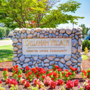 sign outside community that says callahan village