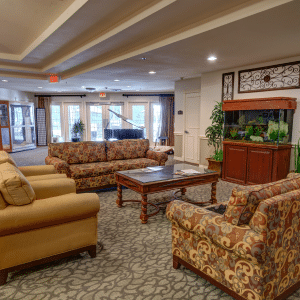 Lounging area with couches chairs and a table