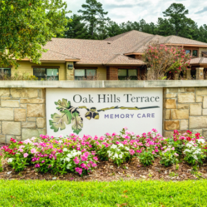 sign outside of community that says Oak Hills Terrace