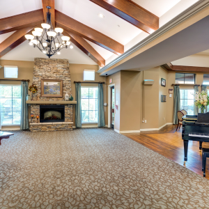 Open area with piano and high ceilings