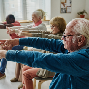 Group of elderly people smiling and stretching