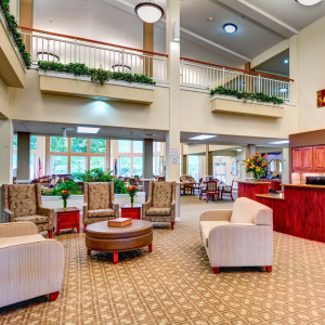 lobby area with front desk and lounge chairs