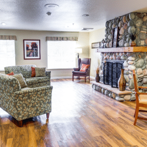 lounge area with fireplace and couches