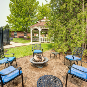 fire pit and chairs around
