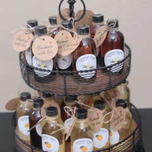 2 tiered stand holding bottles of soap