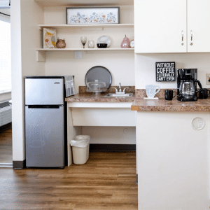 kitchen with refrigerator and cabinets