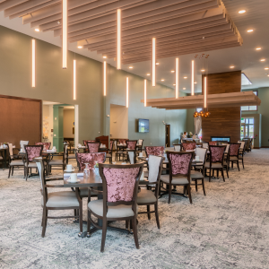 The cozy dining room at the senior living community, where residents gather for delicious meals and lively conversations.
