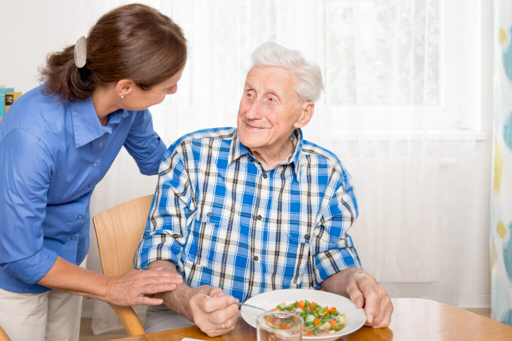 Caregiver with senior man