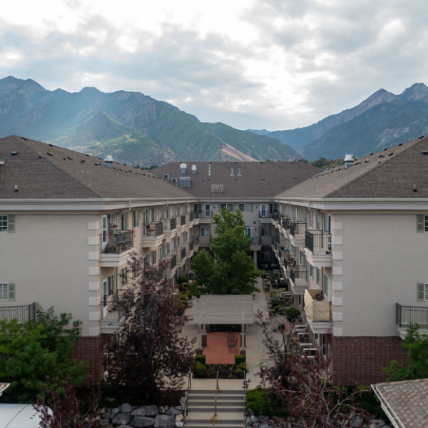 Outside view of community building with mountains in the background