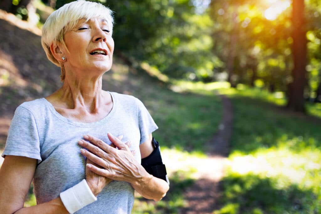 Senior woman athlete have sore left chest pain dizziness